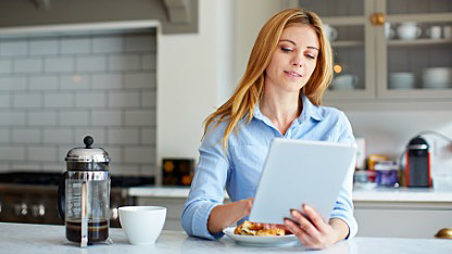 Lady using tablet Lady using tablet