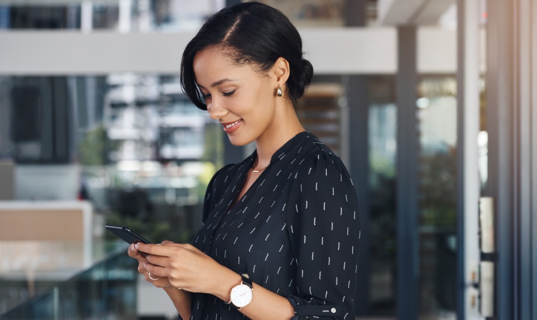 Business woman using eQ Mobile app