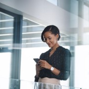 Business woman using a mobile phone