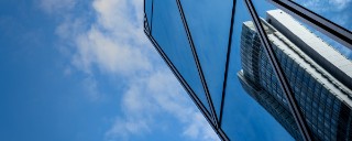 Skyscraper reflecting skyline