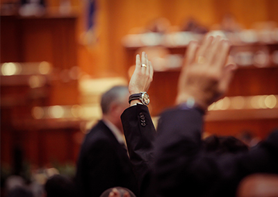 raised hands at meeting